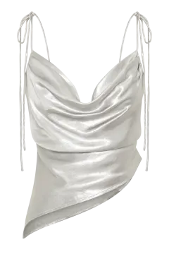 a woman wearing a silver metallic top