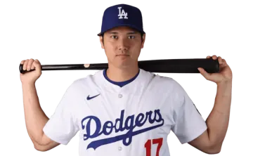 a man holding a baseball bat in his hands