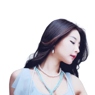 a woman wearing a blue dress and pearls necklace