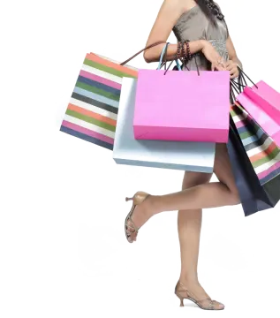 a woman carrying shopping bags