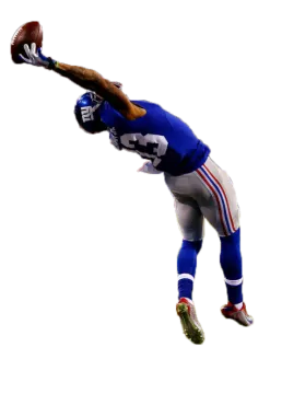 a football player catching a ball in the air