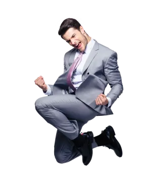 a man in a suit and tie jumping