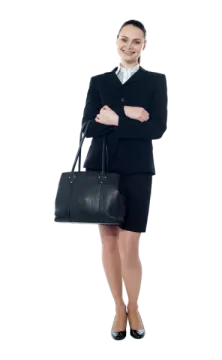 a woman in a business suit holding a black bag