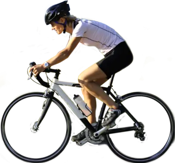 a person riding a bike on a white surface