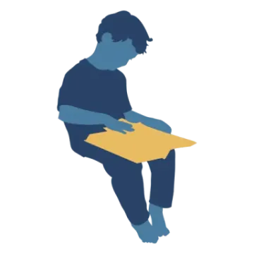 the silhouette of a man sitting on a box