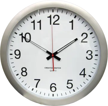a white clock with black numbers on it
