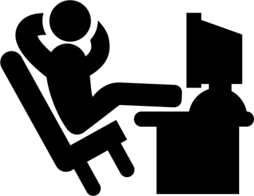 a black and white silhouette of a person sitting at a desk