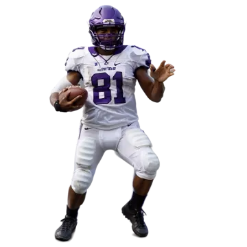 a man in a uniform holding a football ball
