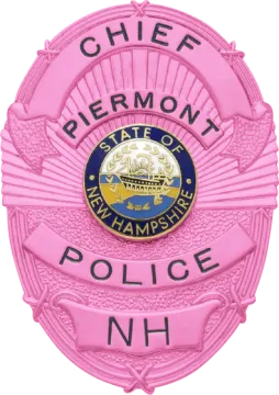 a pink badge with the words fremont police on it