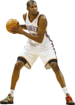 a man holding a basketball ball in his hand