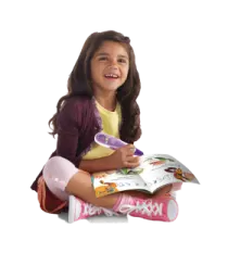 a little girl sitting on the floor reading a book