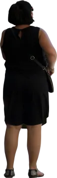 a woman in a black dress and hat