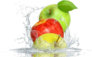 an apple is splashing into the water