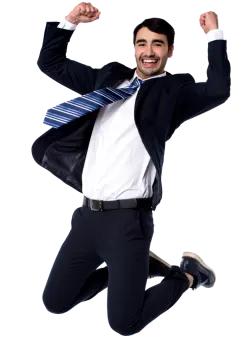 a man in a suit and tie jumping