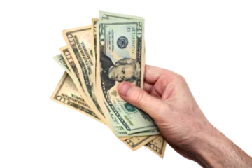 a person holding money in their hand