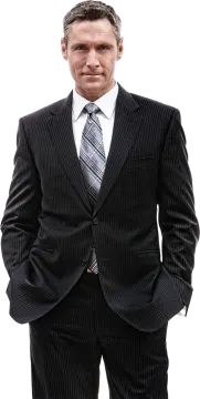 a man in a suit and tie posing for the camera