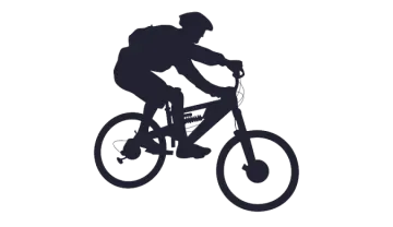 a silhouette of a person riding a bike