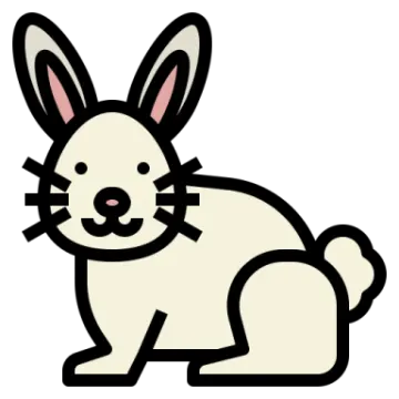 a white rabbit sitting down on the ground