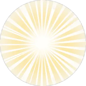 a yellow and white circle with rays