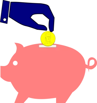 a hand putting a coin into a piggy