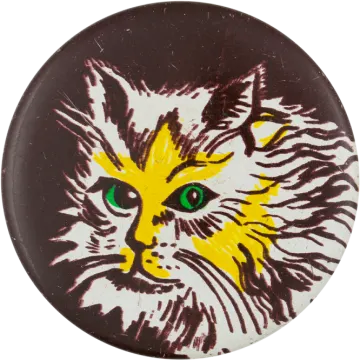 a button with a cat's face painted on it