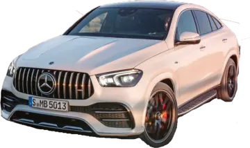 a white mercedes gle parked on a road