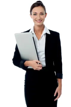 a woman in a business suit holding a laptop