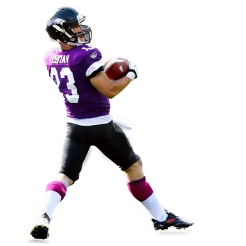 a man in a uniform holding a football
