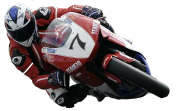 a person riding a motorcycle on a track