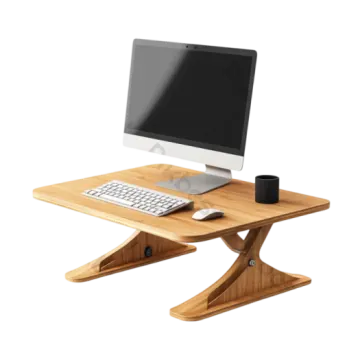 a computer sitting on top of a wooden desk