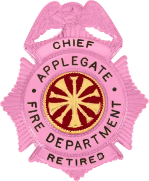 a pink badge with an eagle and the words apache fire department