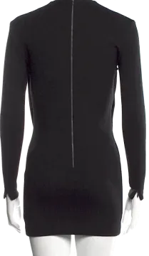 the back of a black sweater with zippers