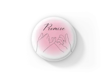 a pink button with the word peace written on it