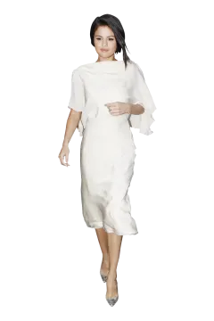 a woman wearing a white dress and heels