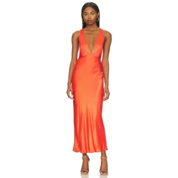 a woman in an orange dress