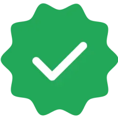 a green seal with a check mark on it