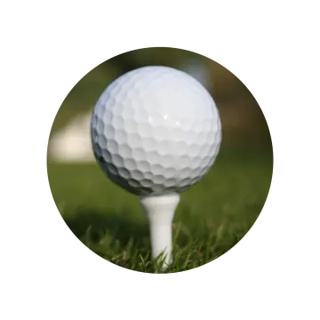 a golf ball sitting on top of a white tee