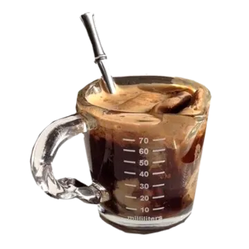 a glass mug filled with iced coffee