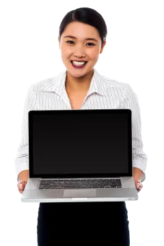 a woman holding up a laptop computer
