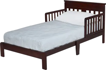 a todd's bed with a white sheet on it