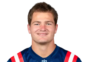 a young man in a football uniform