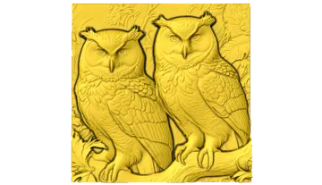 a pair of owls sitting on a tree branch
