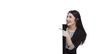a woman in a business suit pointing at the wall