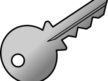 a silver key on a white background