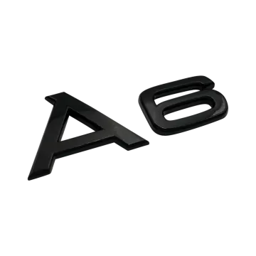 a pair of black plastic letters on a white background