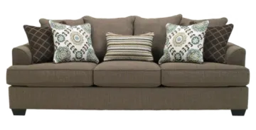 a brown couch with pillows on it
