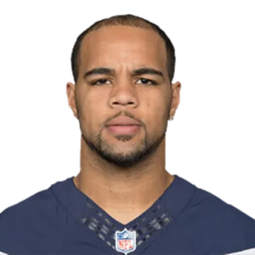a football player wearing a blue uniform