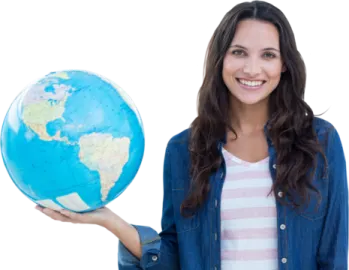 a woman holding a globe and smiling