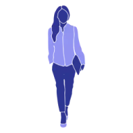 a woman walking down the street with her headphones on