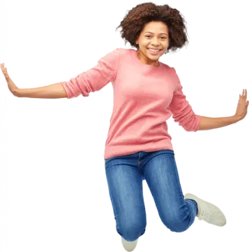 a young girl jumping in the air